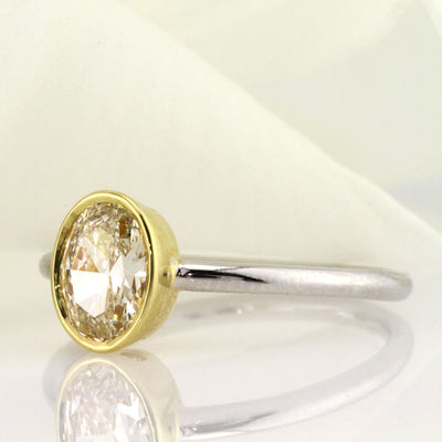 1.06ct Fancy Light Yellow Oval Cut Diamond Engagement Ring