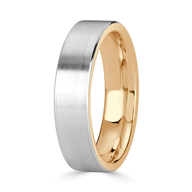 Men's two-tone satin finish wedding band in white and yellow gold.