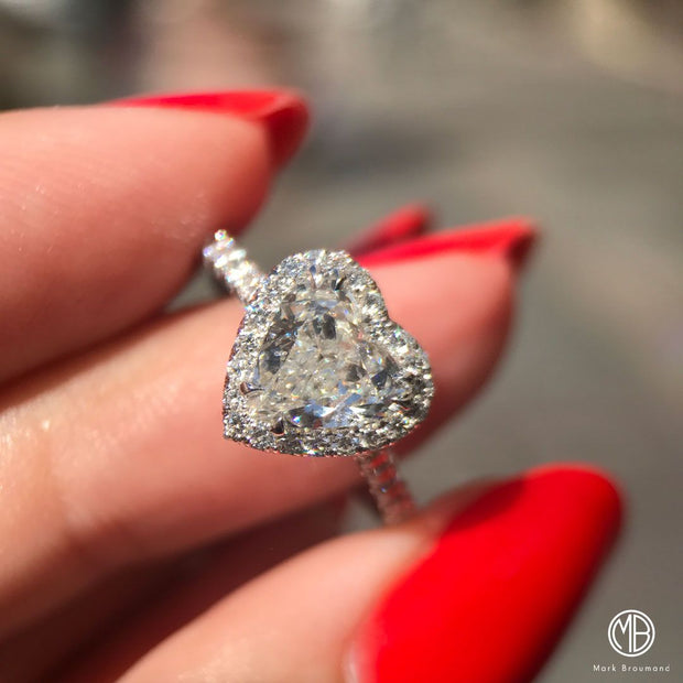 A woman with red nails wears a handcrafted custom Heart-Shaped Diamond Engagement Ring.