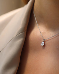 0.25ct Emerald and Trapezoid Cut Mosaic Diamond Pendant in 18k White Gold