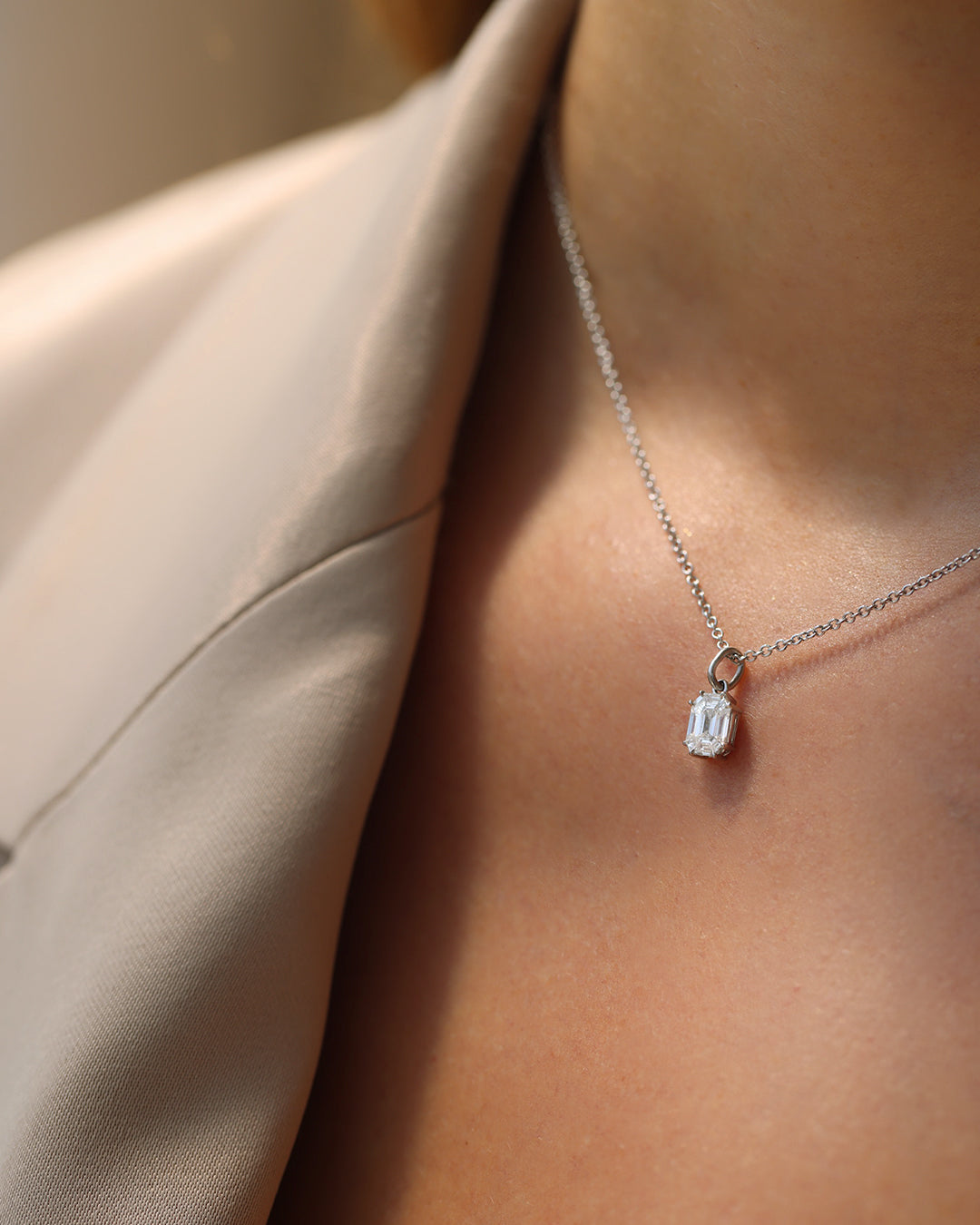 0.25ct Emerald and Trapezoid Cut Mosaic Diamond Pendant in 18k White Gold