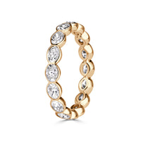 2.24ct Oval Cut Diamond Bezel Set Eternity Band in 18K Champagne Yellow Gold