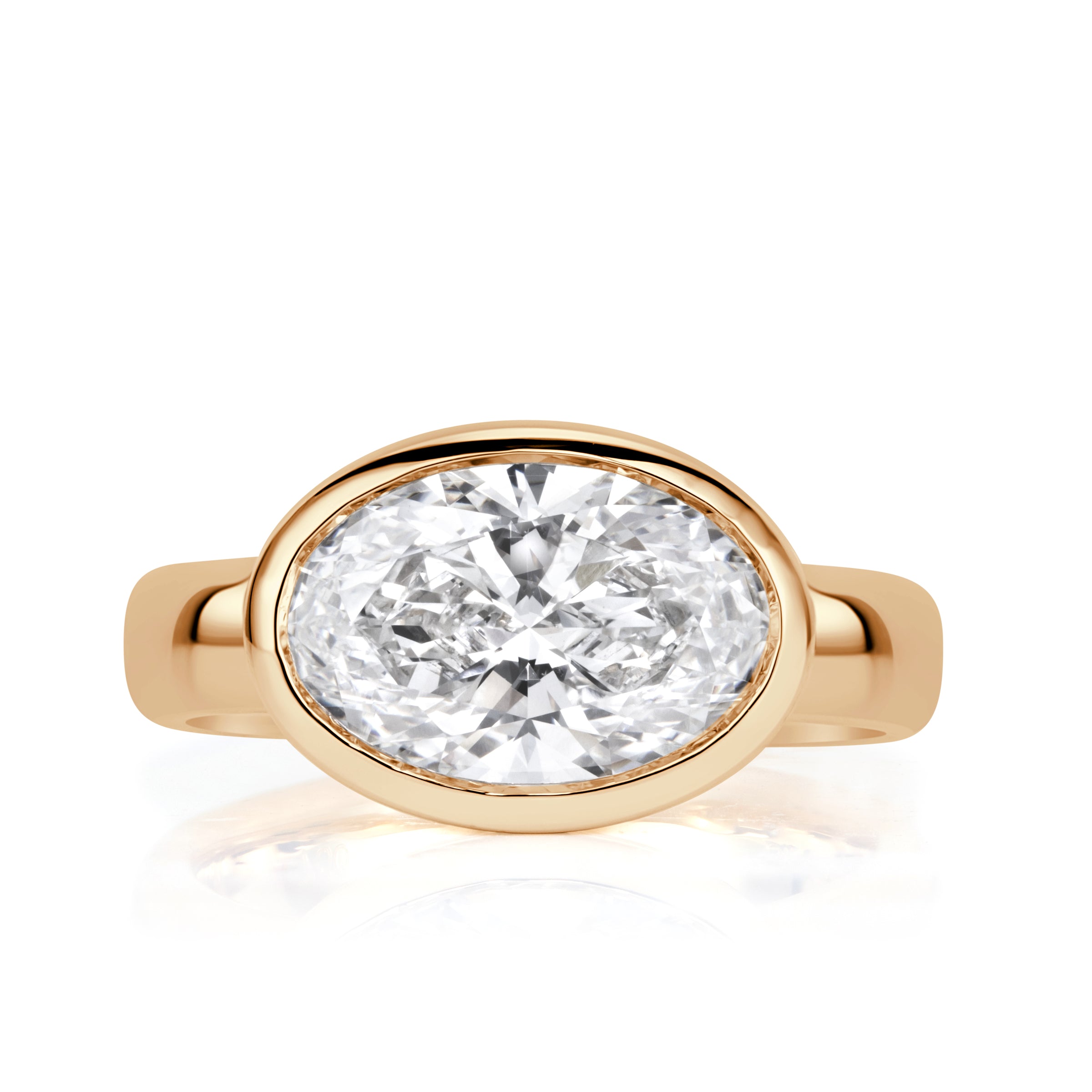 Oval lab diamond bezel set horizontally with 4mm polished band. 