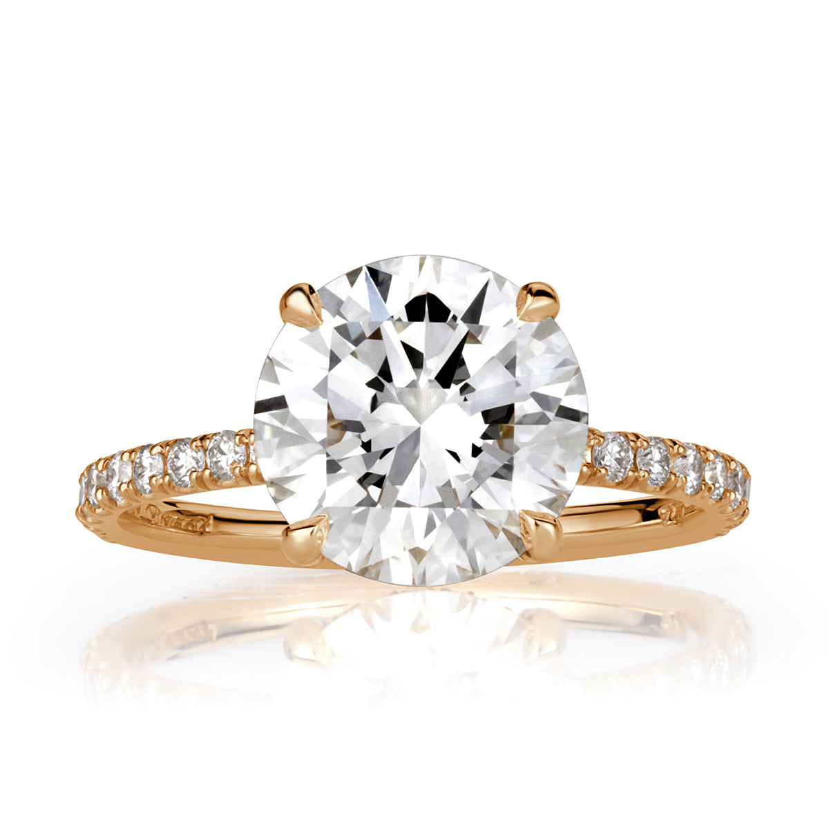 Round cut lab grown diamond with pave diamond band and hidden halo of diamonds in 18k yellow gold. 