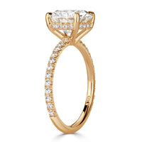 Vertical view of Round cut lab grown diamond ring with pave diamond band and hidden halo of diamonds in 18k yellow gold. 