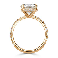 Straight vertical view of round cut lab grown diamond ring with pave diamond band and hidden halo of diamonds in 18k yellow gold. 