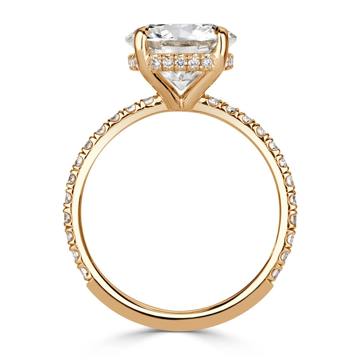 Straight vertical view of round cut lab grown diamond ring with pave diamond band and hidden halo of diamonds in 18k yellow gold. 