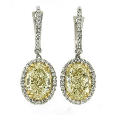 7.21ct Fancy Yellow Oval Cut Diamond Earrings