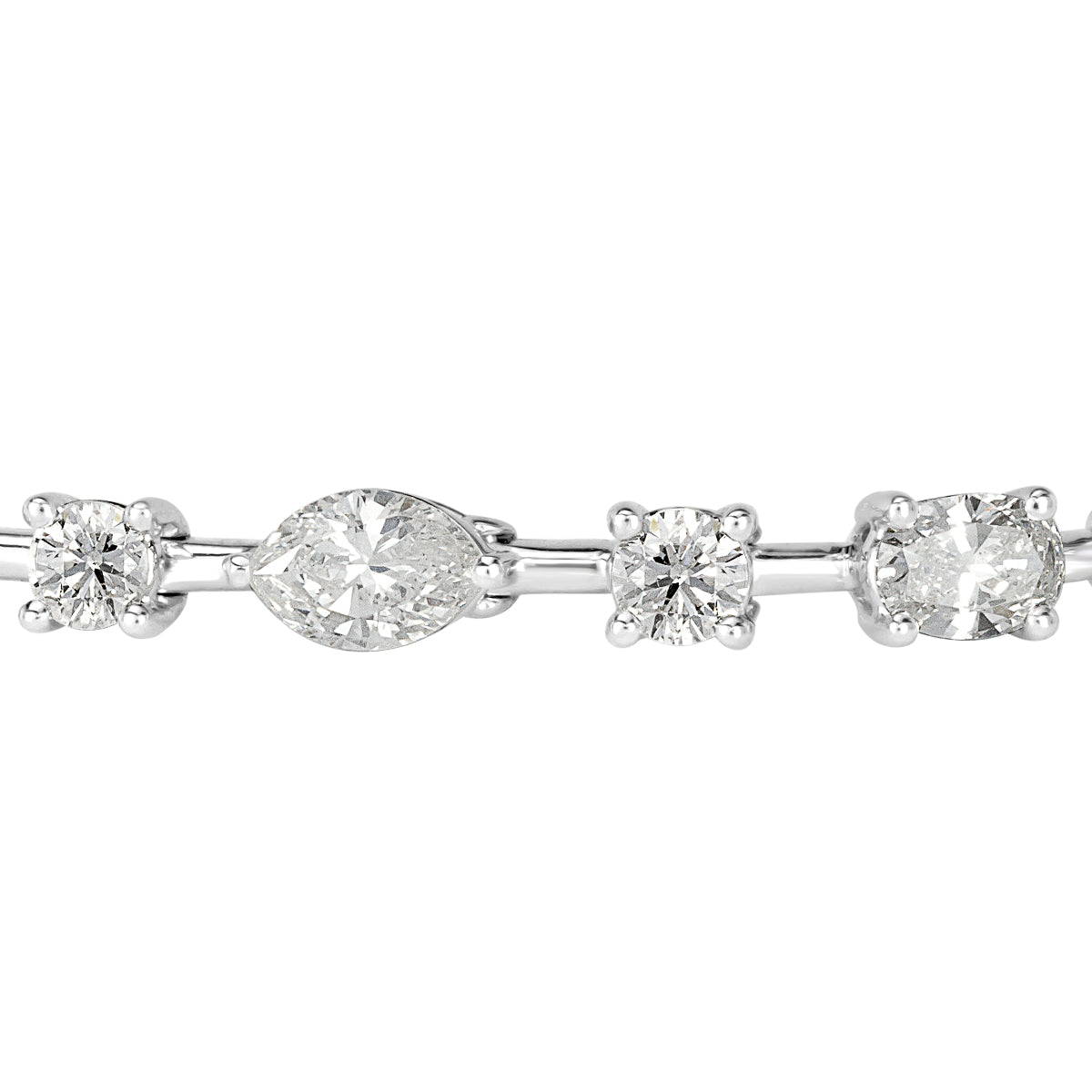 6.02ct Oval Cut, Marquise Cut and Round Brilliant Cut Diamond Tennis Bracelet in 18k White Gold