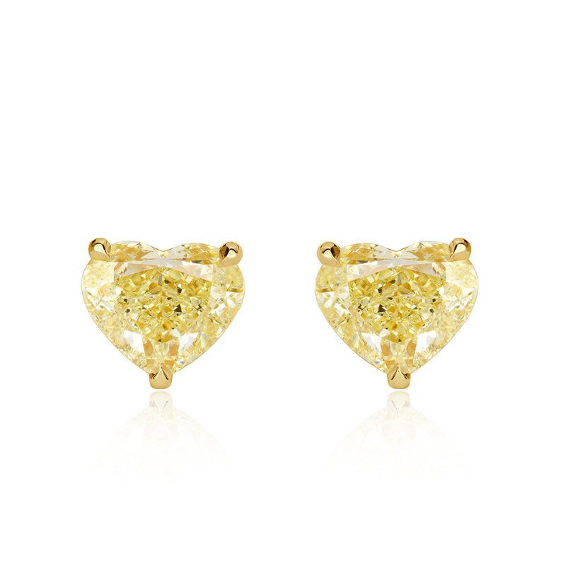 6.77ct Fancy Light Yellow Heart Shaped Diamond Stud Earrings