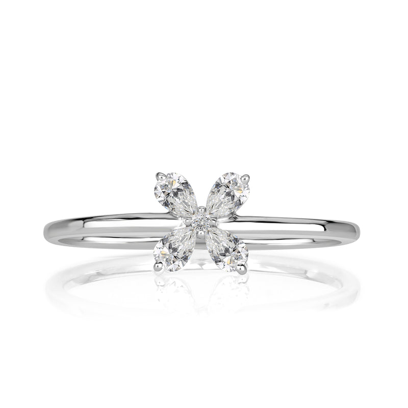 0.15ct Pear Shaped and Round Brilliant Cut Diamond Floral Ring in 18k White Gold