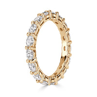 1.50ct Oval Cut Diamond Eternity Band in 18k Champagne Yellow Gold